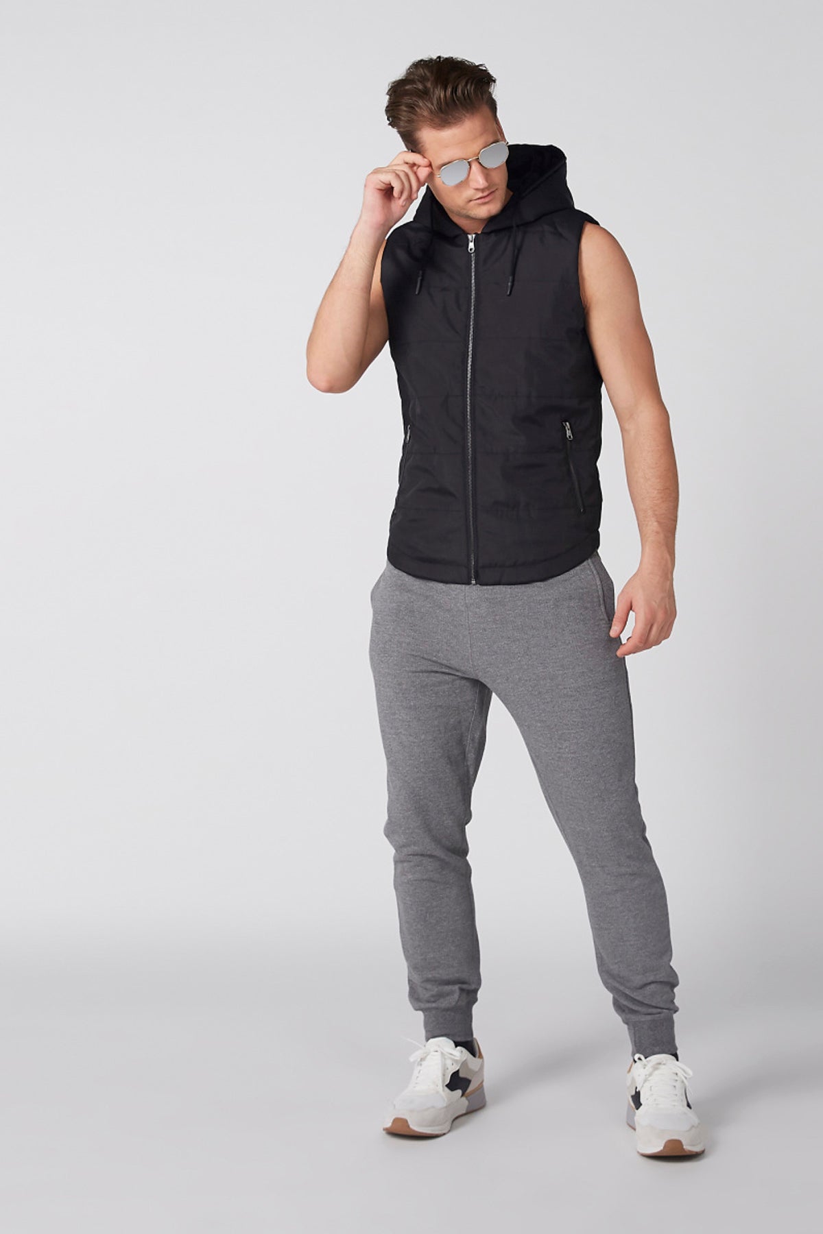 Sleeveless Jacket with Zip Closure and Hood