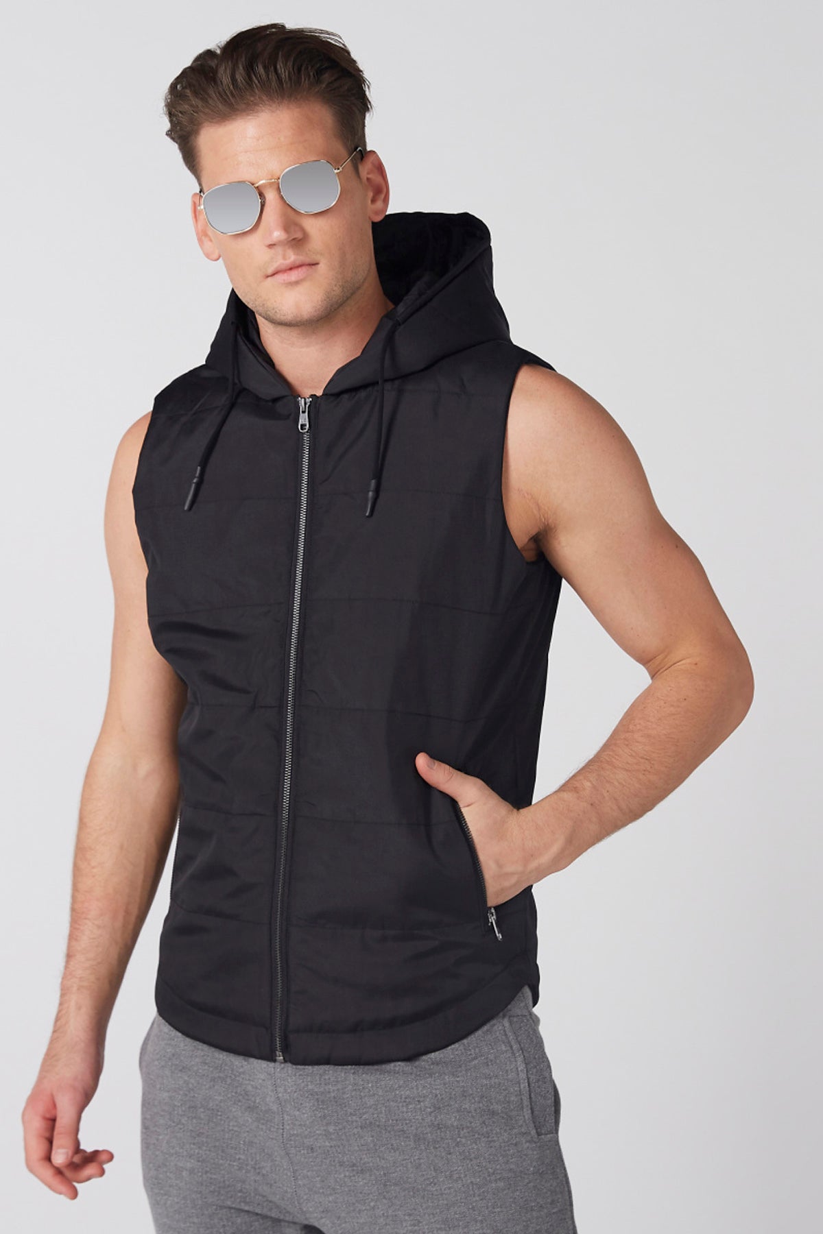 Sleeveless Jacket with Zip Closure and Hood