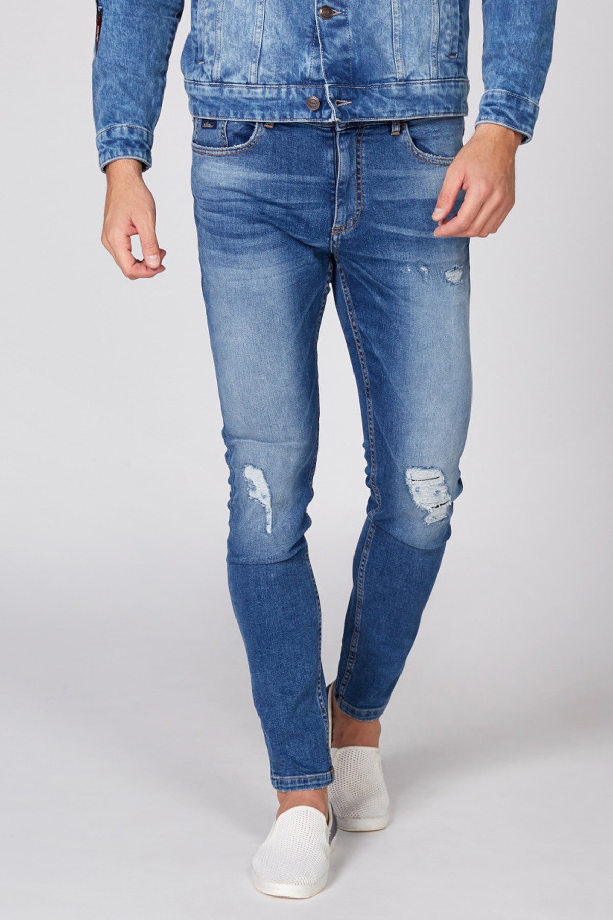 Distressed Full Length Jeans with Button Closure and Pocket Detail
