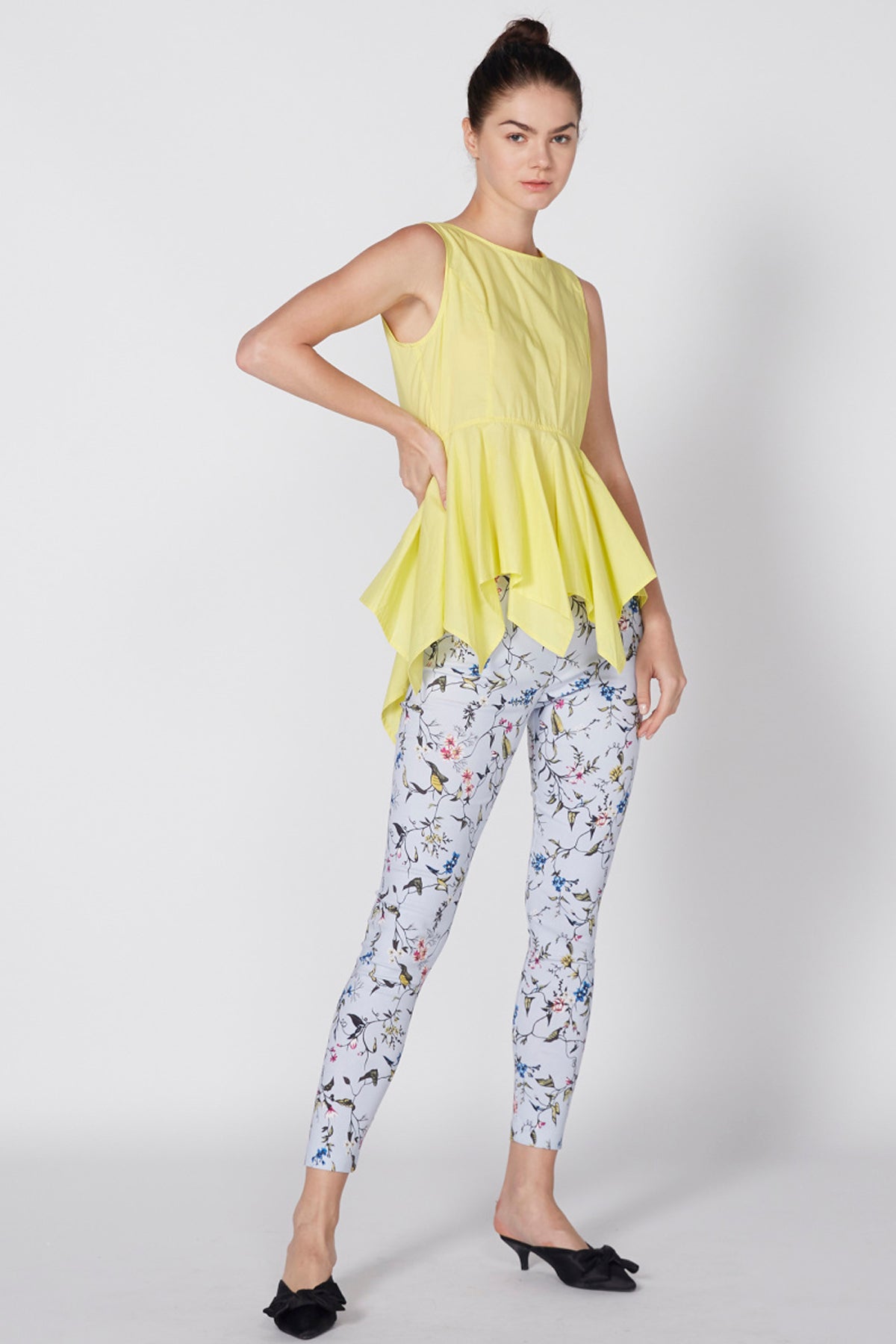 Sleeveless Top with Round Neck and Button Closure
