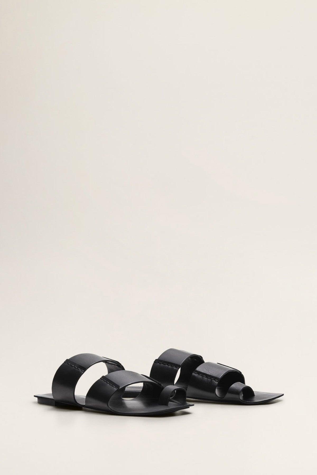 Asymmetric leather sandals