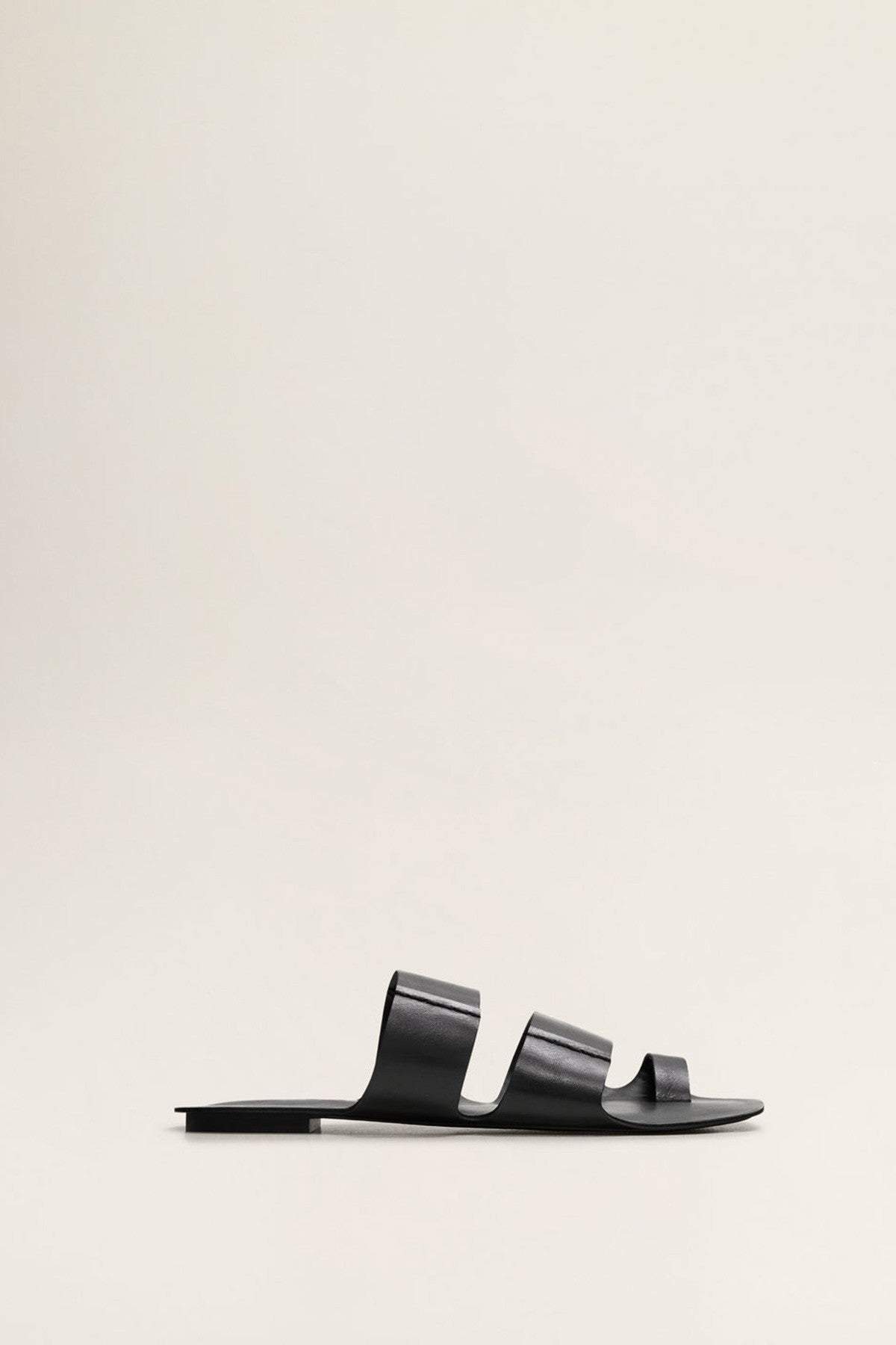 Asymmetric leather sandals