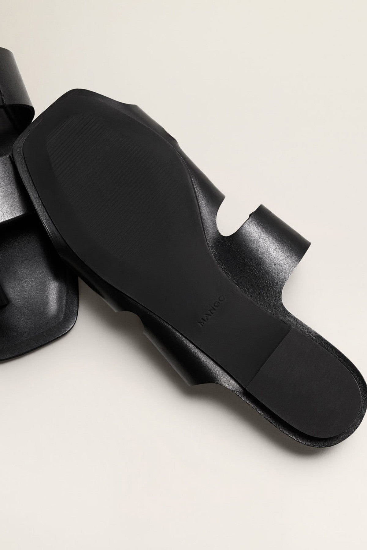 Asymmetric leather sandals