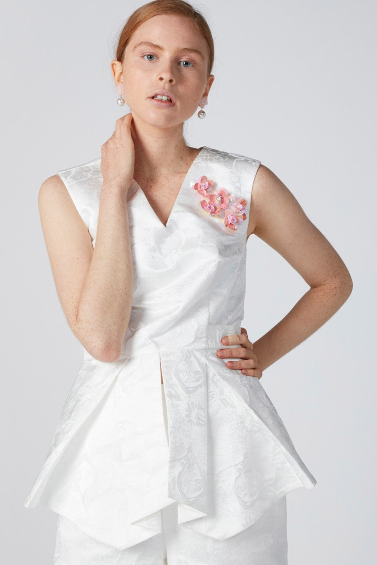 Sleeveless Textured Top with Flower Applique Detail and Tie Ups