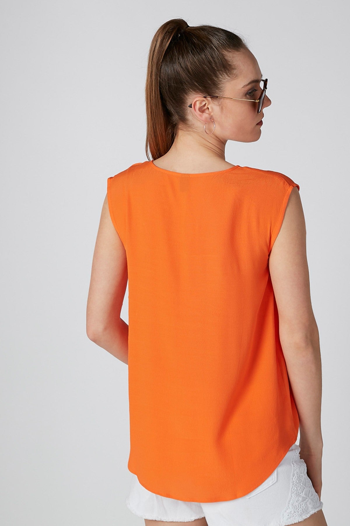 Textured Sleeveless Top with V-neck